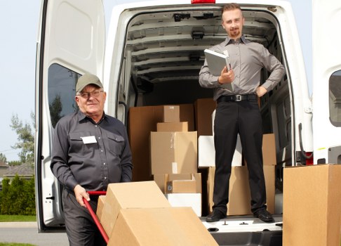 Student removals planning in Westhampstead with boxes and moving van