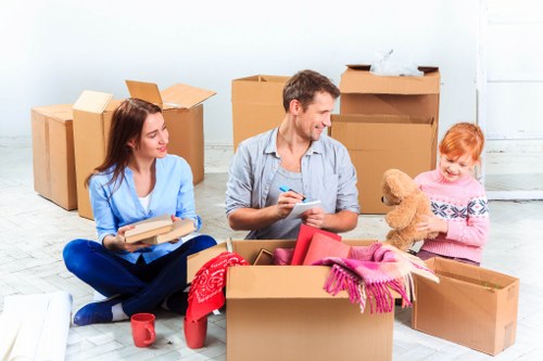 Professional piano removals service handling an upright piano in Westhampstead