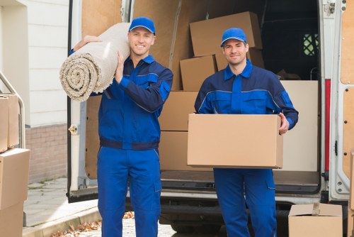 Moving team preparing equipment and safety checks before a relocation