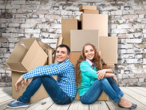 Unloading boxes at a new home during house removals in Westhampstead