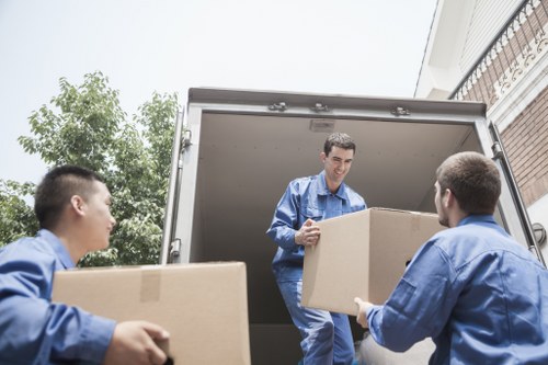 Removal team planning a moving booking with a customer