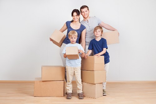 Boxes and furniture being organised for a West Hampstead move