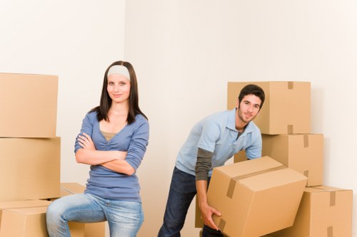 Careful wrapping of fragile items during a home move in Westhampstead