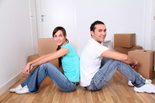 West Hampstead movers handling packed boxes with attention to detail