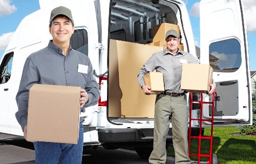 Planning an office relocation in Westhampstead with labelled moving boxes