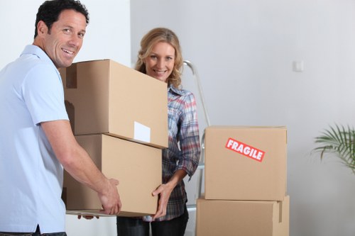 Packed office crates and moving equipment ready for relocation