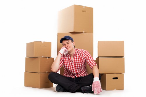 Movers completing a careful, well-controlled relocation with safety focus